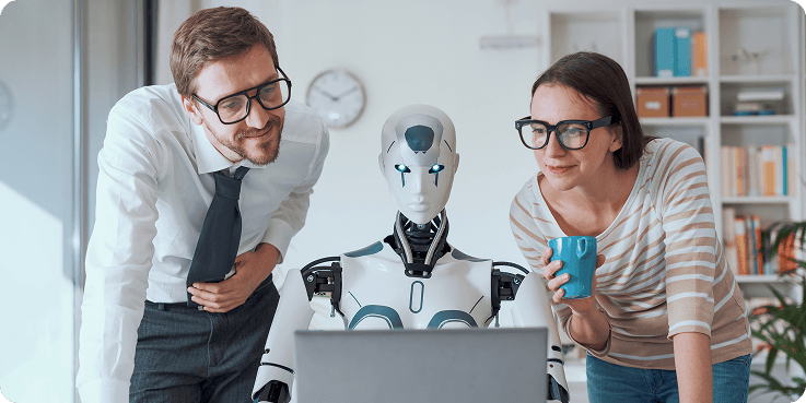 dos personas trabajando con un robot